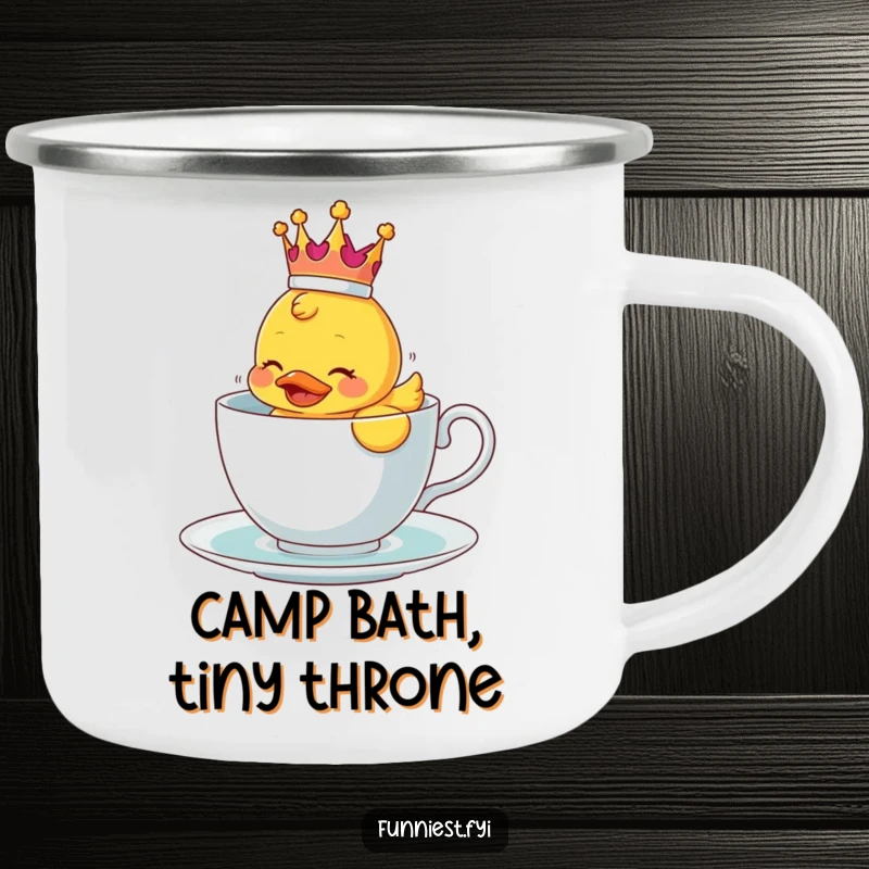 Funny camping mug with a crowned rubber ducky comically floating in a teacup, for outdoor laughs.