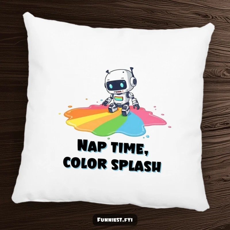 Funny pillow featuring a clumsy robot character tripping and spilling a large puddle of rainbow paint, adding a splash of cheerful humor to any decor.