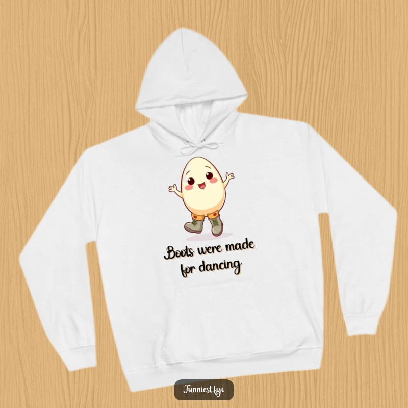 Funny egg hoodie featuring a cheerful cartoon egg character doing a clumsy jig in oversized boots, great for cozy, humorous wear.