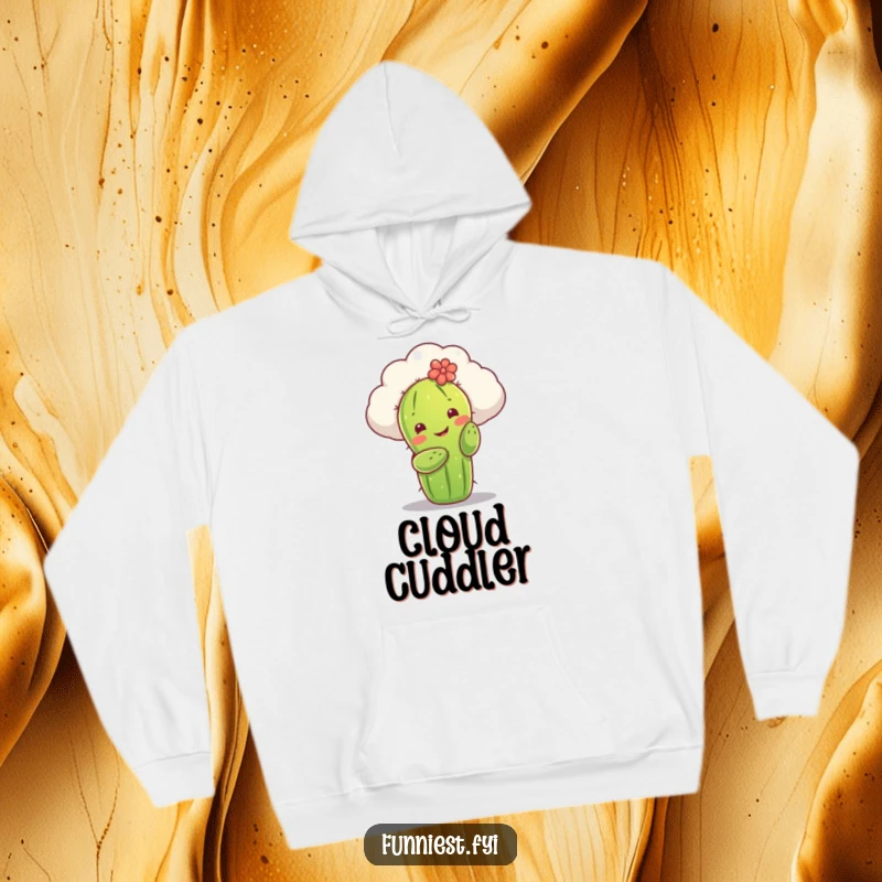 Funny hoodie featuring a smiling cactus character reaching out to hug a fluffy cloud. A warm, soft, and humorous design for comfort lovers.