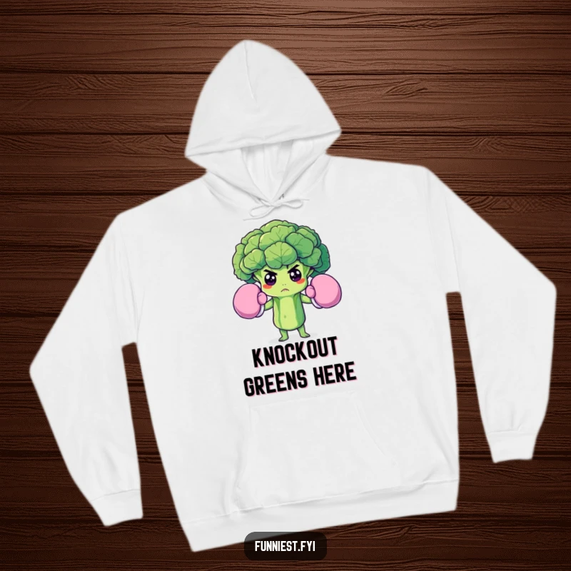 Funny hoodie graphic of a determined broccoli floret wearing oversized boxing gloves, conveying strength and humor for cozy wear.