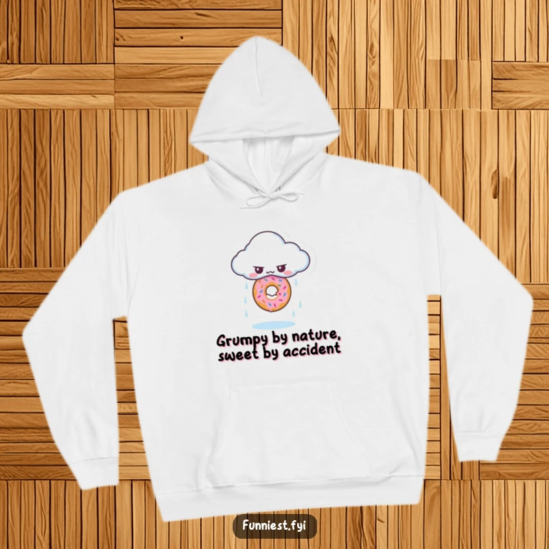 Funny hoodie with a grumpy cloud character raining a single, perfect donut, comfortable and amusing.