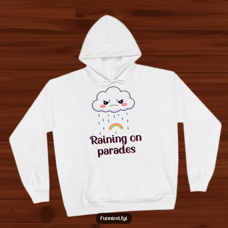 Funny hoodie showing a grumpy cloud raining a tiny rainbow, ideal for cozy, sarcastic, and humorous wear.