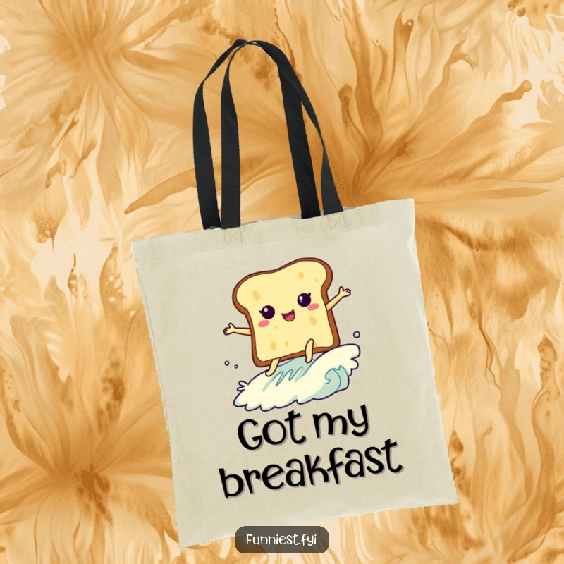 Funny tote bag showing a slice of toast with legs enthusiastically surfing a butter wave, a humorous and practical accessory.